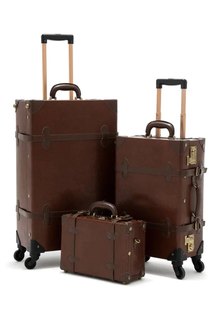 Three caramel brown luggage pieces with handles and wheels from COTRUNKAGE's Minimalism 3 Pieces Luggage Set.