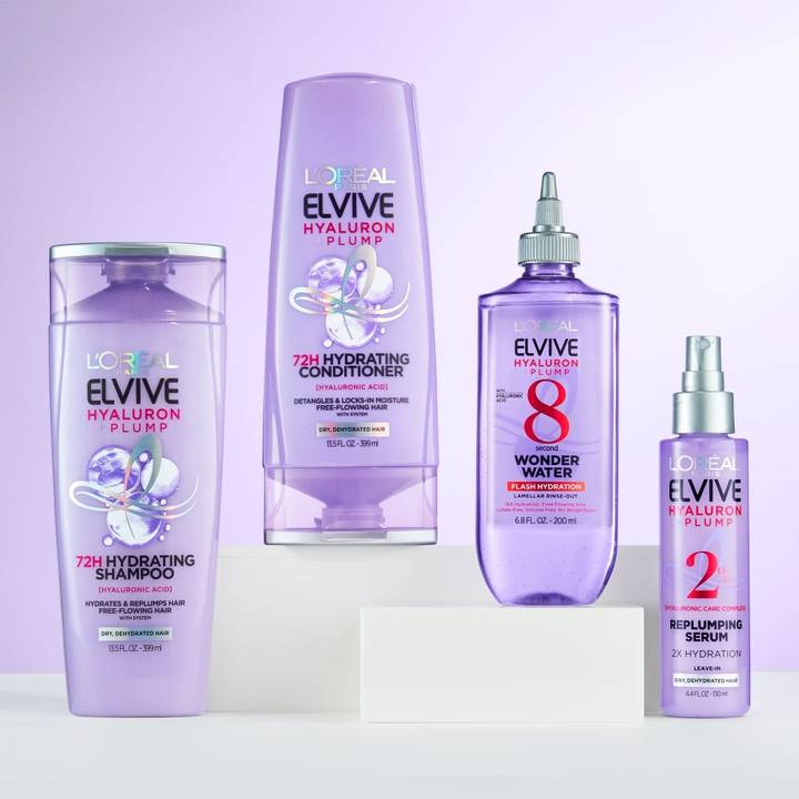 L'Oréal Paris Elvive Hyaluron Plump Hydrating Shampoo + Conditioner showcased against a purple backdrop.