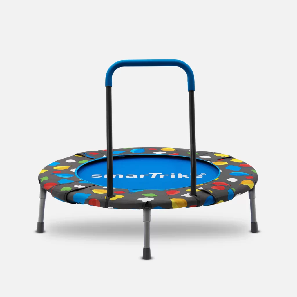A small trampoline with a blue handle and a colorful pattern, perfect for bouncing and having fun!