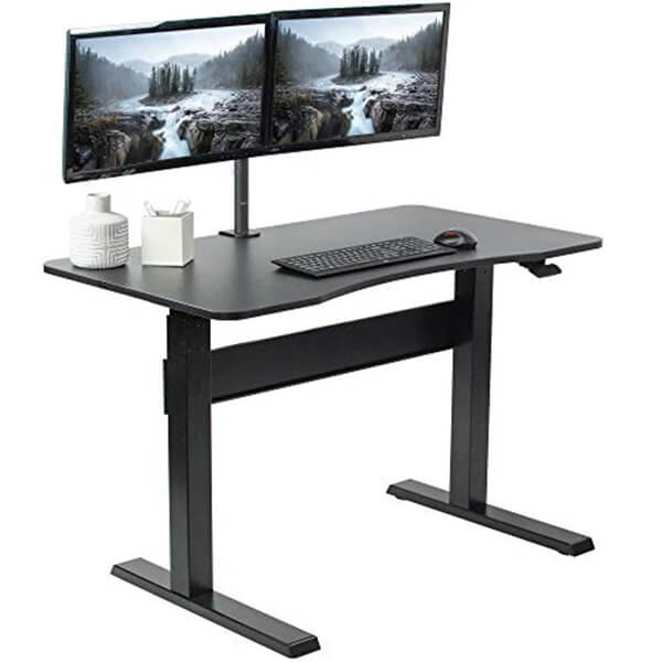 A sleek black standing desk with two monitors on top. Perfect for a productive work setup.