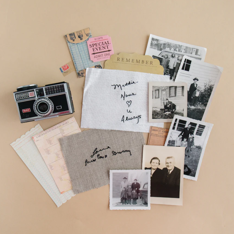Embroidered fabric keepsake showing a handwritten note stitched in black thread on white linen, featured among best personalized gift services.